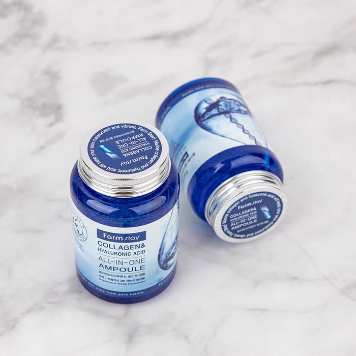 Farmstay Collagen & Hyaluronic Acid All-in-One Ampoule trên nền đá cẩm thạch